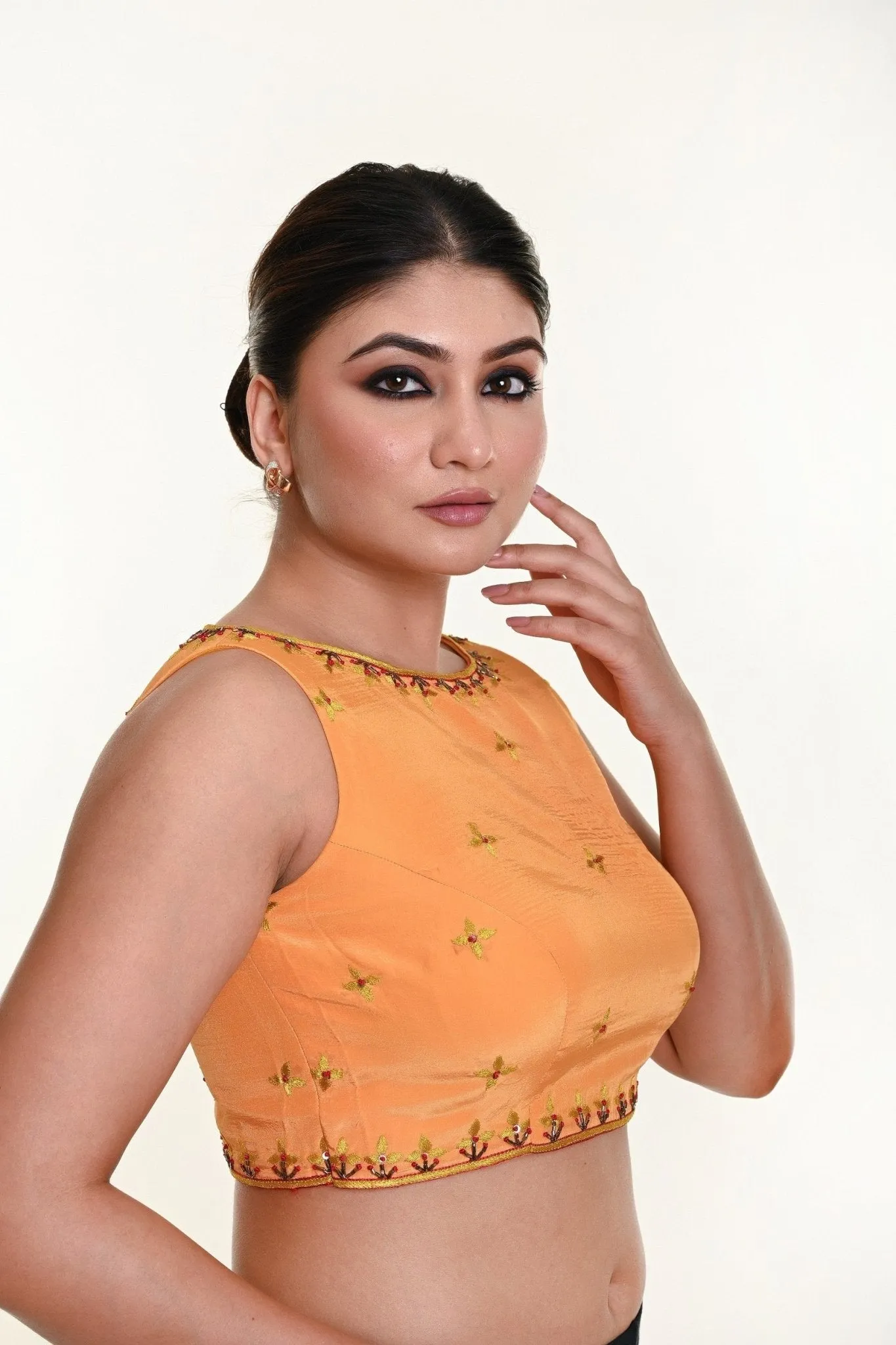 Butter Yellow Sleeveless Blouse in Crepe Silk with Hand Embroidery work