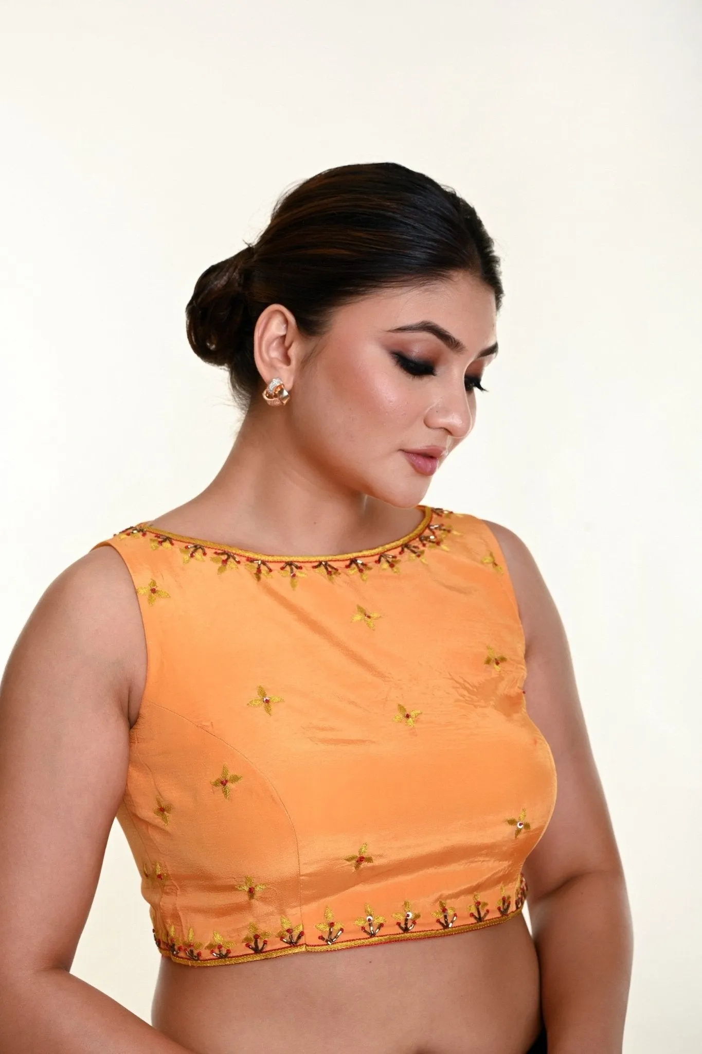 Butter Yellow Sleeveless Blouse in Crepe Silk with Hand Embroidery work
